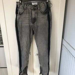 Dark grey jeans.
